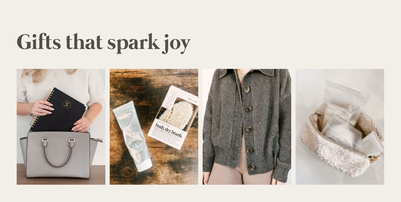 Gifts that spark joy. A spiral black planner, a dry brush, a knitted gray sweater with brown large buttons.